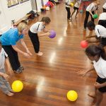 Children developing their ball handling skills