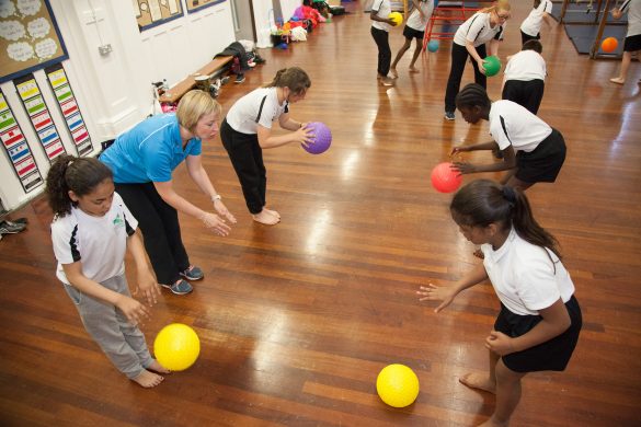 Children developing their ball handling skills